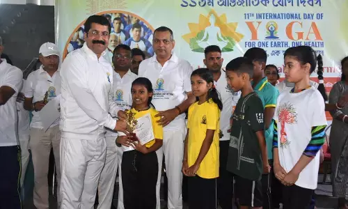 Silchar Celebrates 11th International Yoga Day with Unity and Enthusiasm Silchar Celebrates 11th International Yoga Day with Unity and Enthusiasm